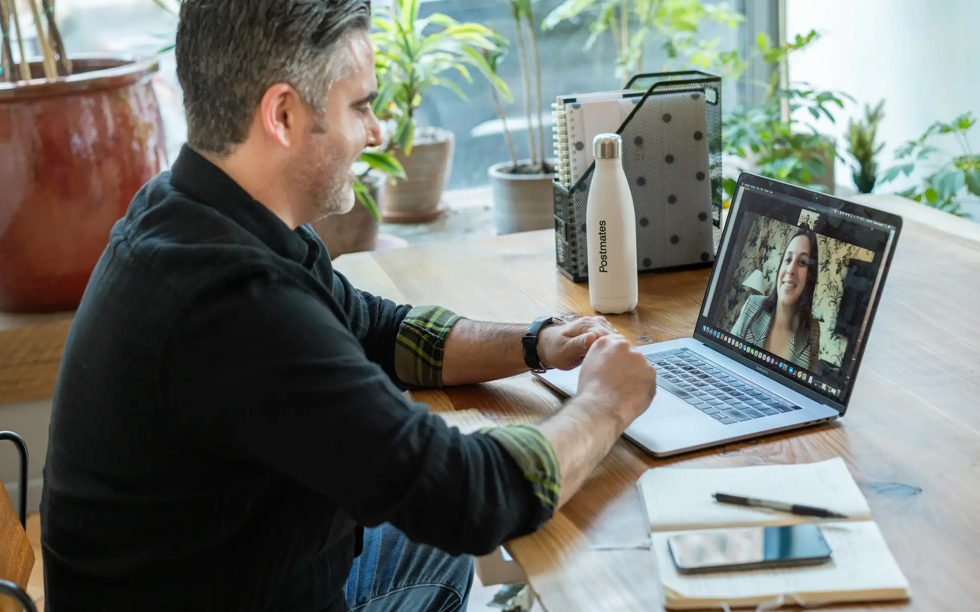 Person using a laptop in a calm home workspace